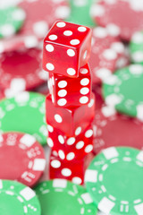 Poker chips and red casino dice