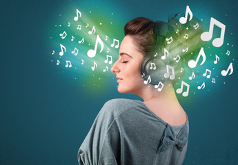 Young woman with headphones listening to music