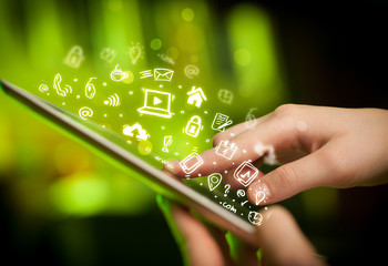 Finger pointing on tablet pc, social media concept © ra2 studio