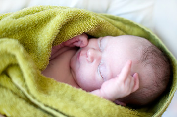 Sleeping newborn baby covered © ssnegireva