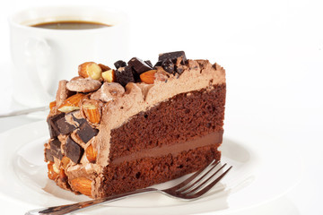 Sweet chocolate cake topping almond nut with coffee