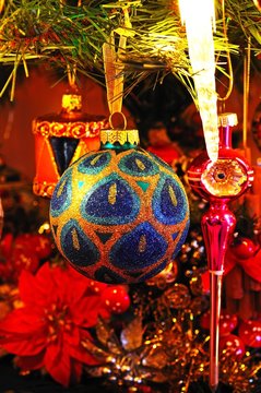 Blue and gold Christmas bauble © Arena Photo UK