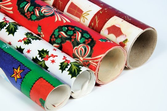 Four rolls of Christmas wrap © Arena Photo UK
