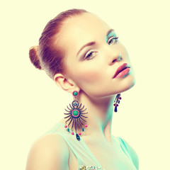 Portrait of beautiful young woman with earring