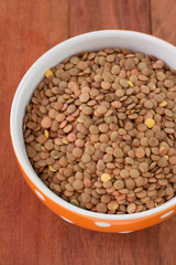lentil in bowl in dark background