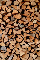 Winter Background Texture Of Split Stacked Wood