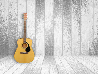 Fototapeta na wymiar Guitar in old room background