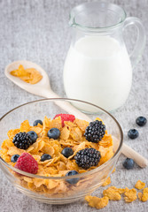 Healthy breakfast with milk and fresh fruit and cereals