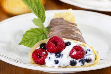 Pancakes with blueberries and raspberries