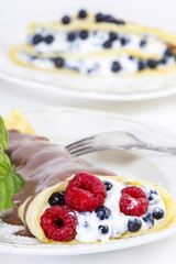 Pancakes with blueberries and raspberries