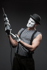 mime with hammer drill