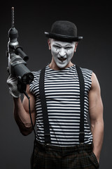 mime with hammer drill