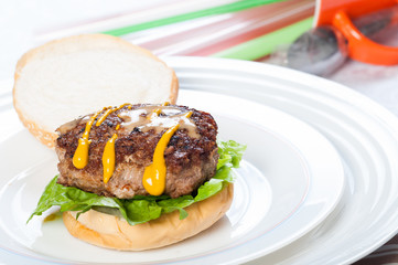 pan fried burger with mustard and sesame dressings