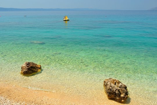 Amazing beach with two big stones near Tucepi, Croatia