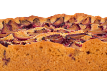 Baked cake with juicy plums