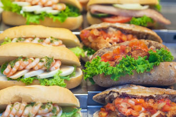 Various sandwiches on a shop counter