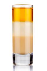 Shot three layers alcohol cocktail isolated on white