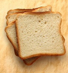 Bread slices on paper background