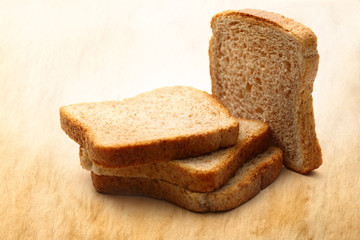 Bread slices on paper background