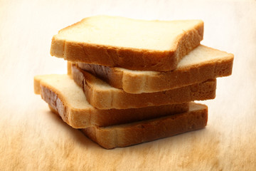 Bread slices on paper background