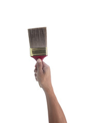 hand holding painting brush