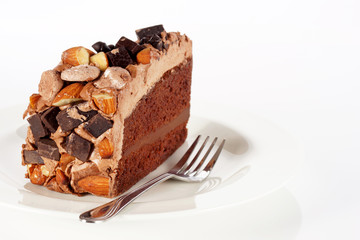 Sweet chocolate cake topping with chocolate and almond nut