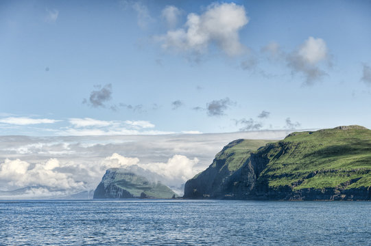 Hestur and Koltur islands on a summer day
