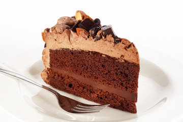 Sweet chocolate cake topping with chocolate and almond nut