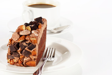 Sweet chocolate cake topping almond nut with coffee