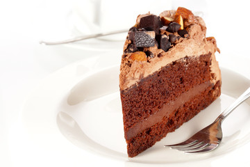 Sweet chocolate cake topping almond nut with coffee
