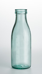 Milk bottle, empty. Isolated with clipping path