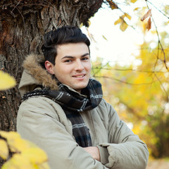 Man portrait in park.