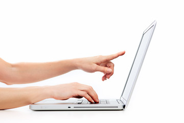 Hands with laptop computer.