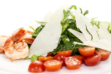 Fototapeta na wymiar shrimp salad greens and avocado cheese and tomatoes