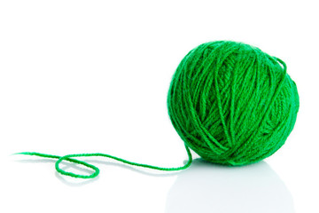 Green wool yarn ball isolated on white  background