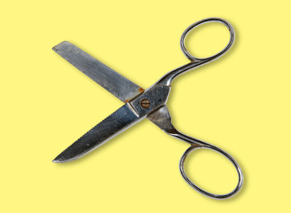 Scissors on yellow