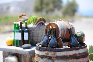 Still-life with wine bottles and barrels