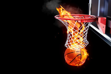 Flaming basketball going through a net © Digital Storm