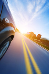 car on the road with motion blur background