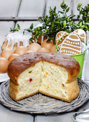 Easter festive yeast cake, gingerbread cookies in green bucket