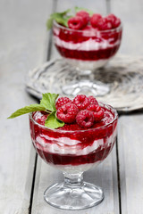 Raspberry dessert on wooden table