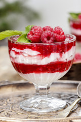 Raspberry dessert on wooden table