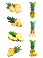 Set of fresh pineapple fruits with cut isolated on white.