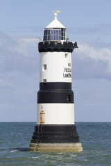 Fototapeta na wymiar Lighthouse at Penmon Point, Anglesey, North Wales