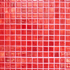 Wall tiled with red tiles