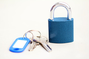 blue padlock with keys