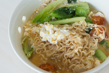 Thai vegetable noodle spicy in white bowl