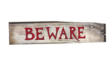 wooden sign that says beware