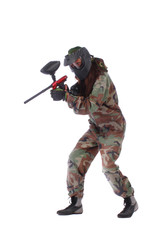 Studio shot of paintball player isolated over white background