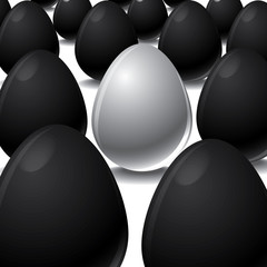 White egg Among Black eggs concept